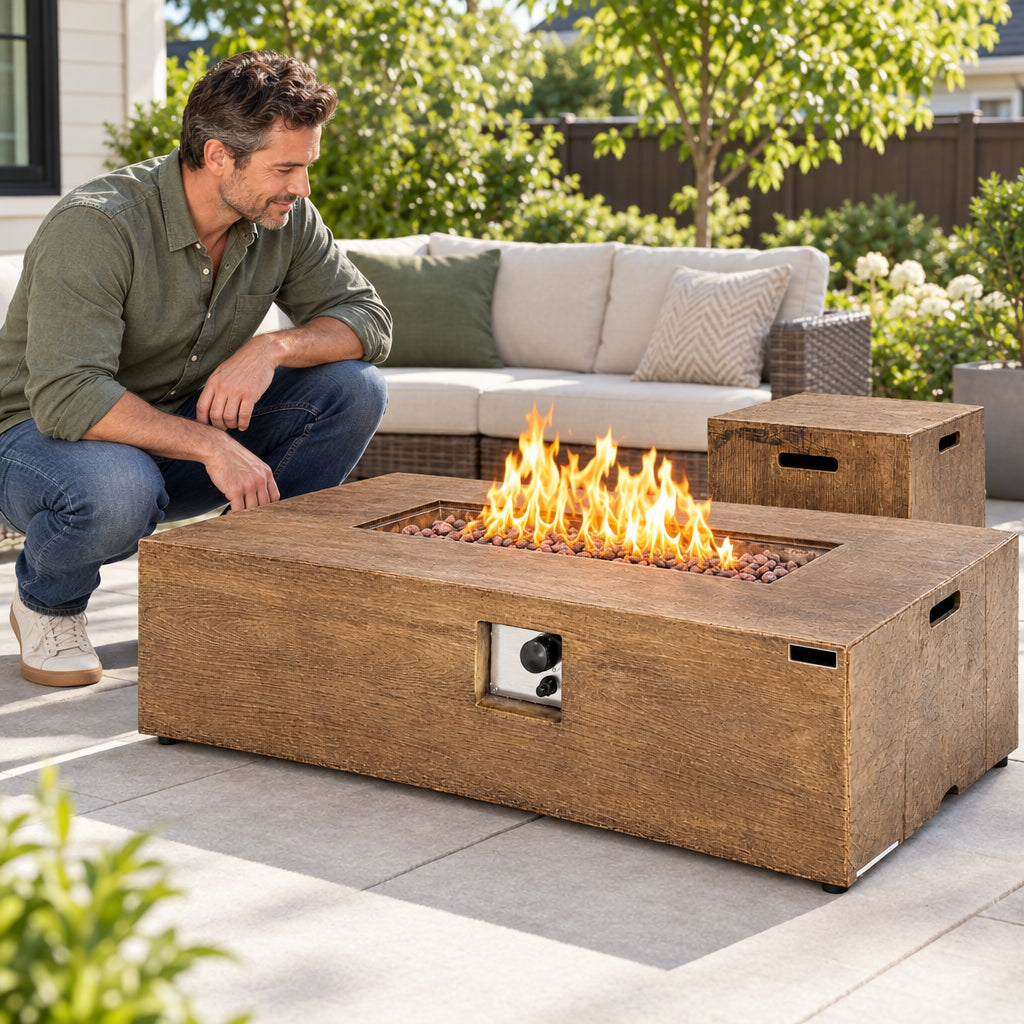 2 Pieces Outdoor Propane Fire, man crouching beside the fire table, examining the lava rocks and flame with calm focus