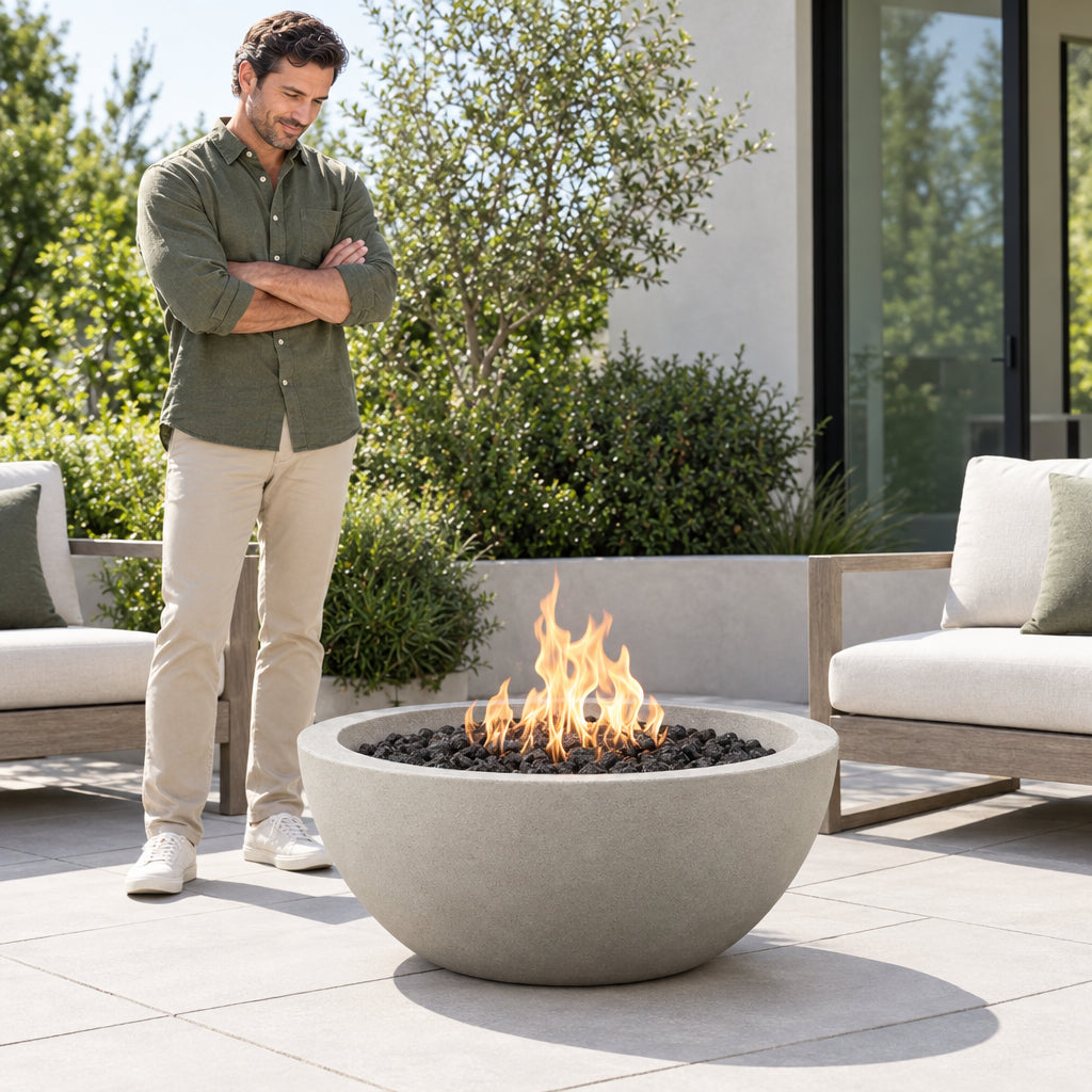 Round Concrete Fire Pit Designed, a man standing with arms loosely crossed